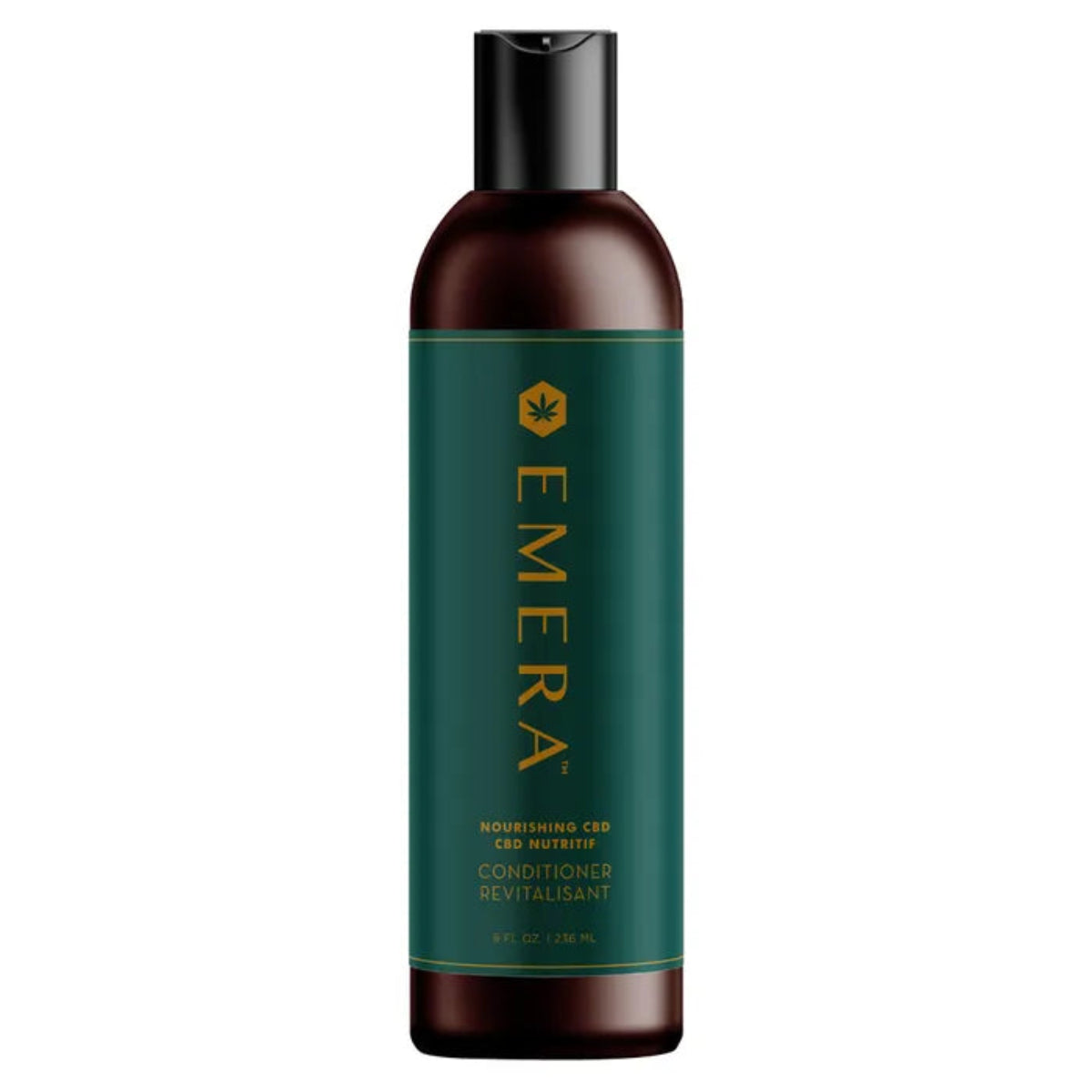 Bottle of Emera conditioner with green label and brown bottle on white background