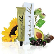 Tube of 'all-nutrient' cream haircolor with avocado, sunflower, and box on a white background