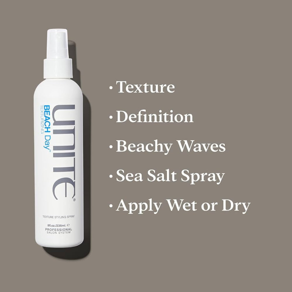 Unite Beach Day sea salt spray bottle on a brown background with product features listed.