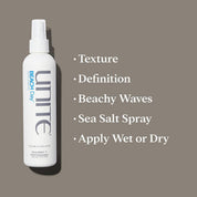 Unite Beach Day sea salt spray bottle on a brown background with product features listed.