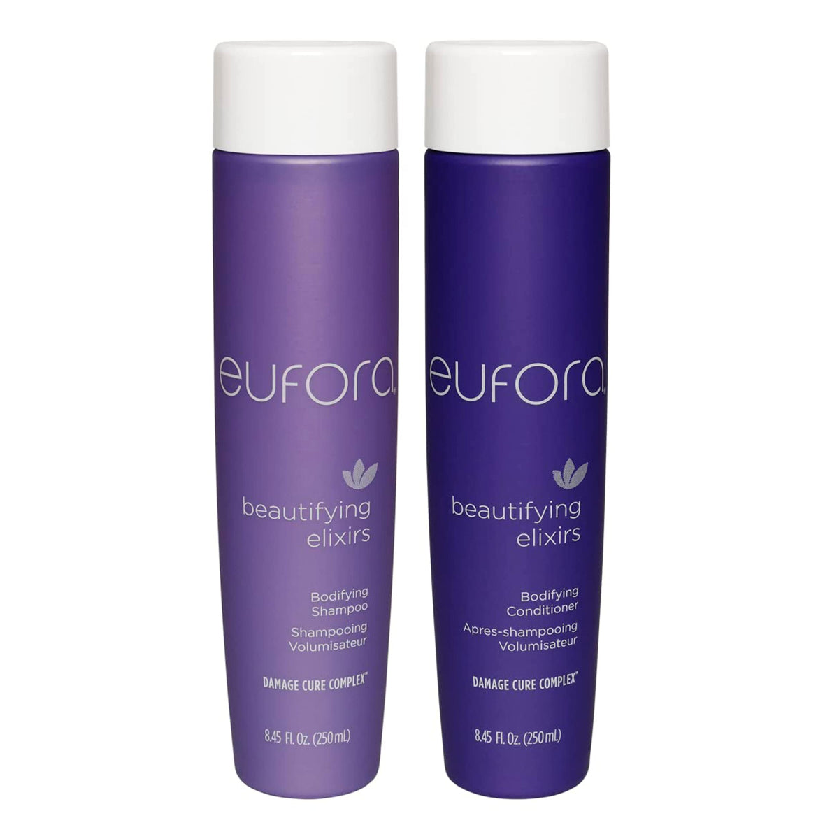 Two purple bottles of eufora Beautifying Elixirs Damage Cure Complex, one with white cap labeled Shampoo and the other labeled Conditioner, on a white background.