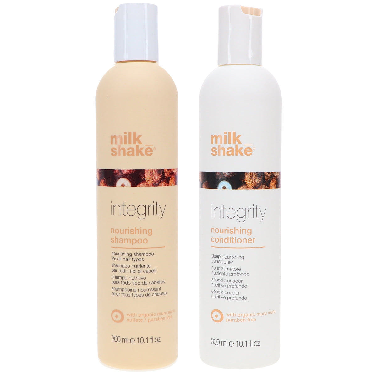 Two bottles of milk_shake Integrity shampoo and conditioner on a white background