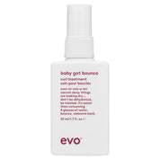 A white bottle of EVO Baby Got Bounce curl treatment with pink text on a plain white background.