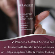 Keranique volumizing keratin conditioner bottle held by a hand with product details below.
