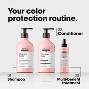 Three pink L'Oréal Professionnel Vitamine Color haircare bottles arranged on a light gray background with black text labels reading Shampoo, Conditioner, and Multi-benefit treatment.