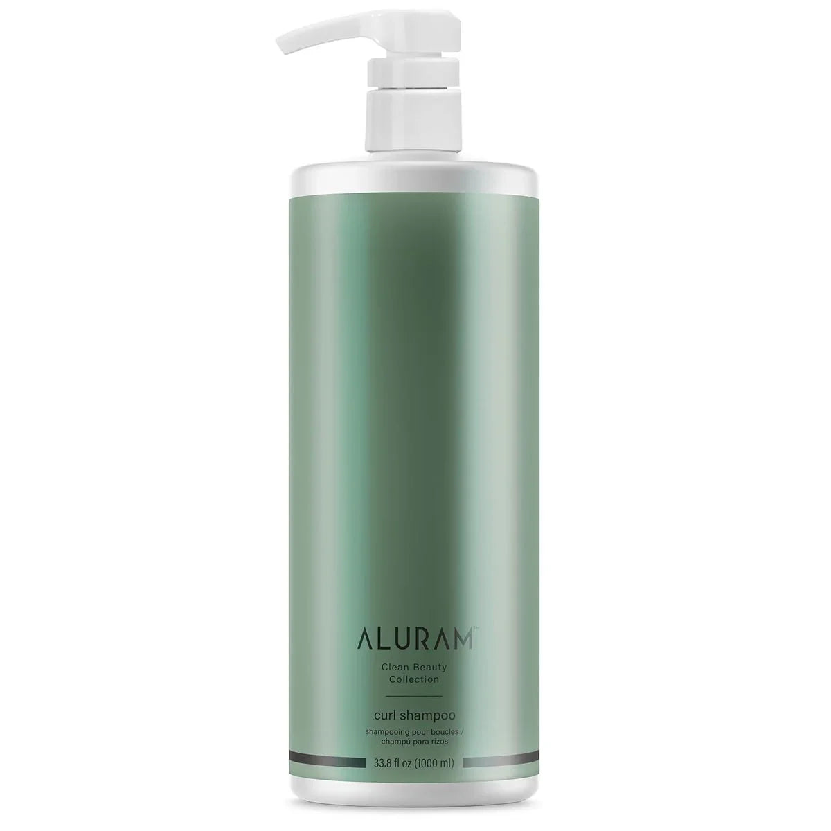 Green shampoo bottle with pump labeled 'Aluram Clean Beauty Collection Curl Shampoo 33.8 oz' on a white background
