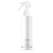 White spray bottle with Aluram Clean Beauty Collection Leave-In Conditioner on a white background