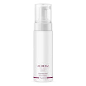 Aluram volumizing foam bottle on a white background