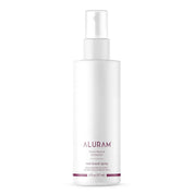 Aluram root boost spray bottle on a white background