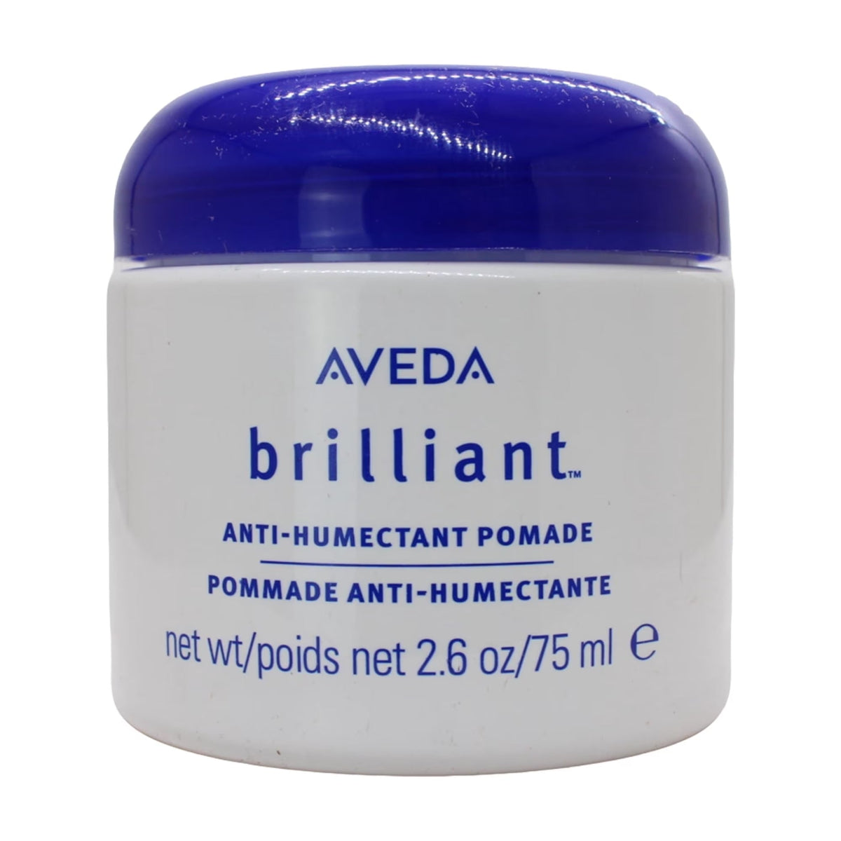 A white jar of Aveda Brilliant Anti-Humectant Pomade with a glossy dark blue lid, shown on a plain white background.