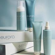 Eufora hair care products on a light gray background