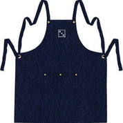 Navy blue apron with gold buttons on a white background