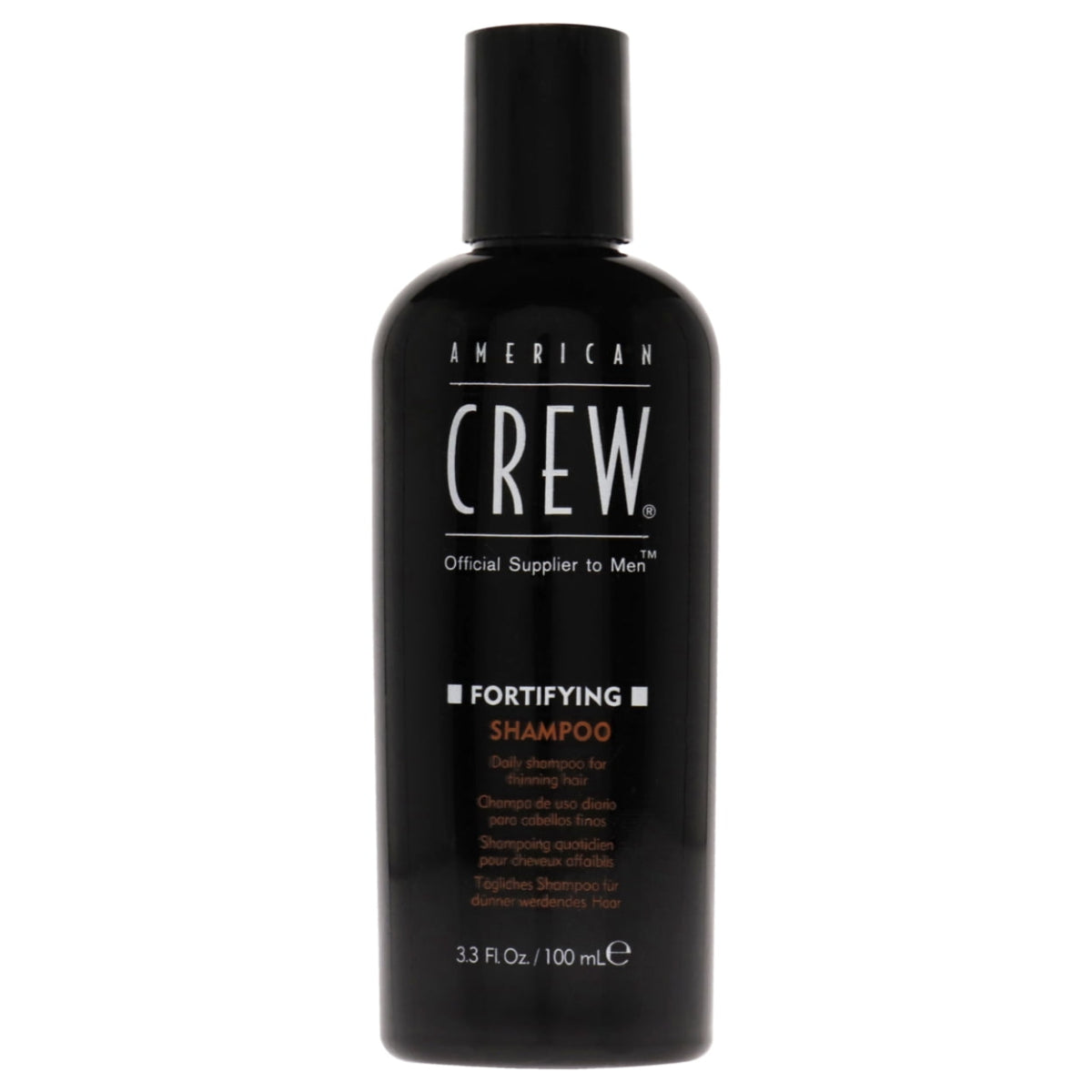 A black bottle of American Crew Fortifying Shampoo for Men, 3.3 oz in size, with white and orange text labeling.