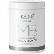 A white plastic jar of Keune Color Ultimate Blonde Magic Blonde lifting powder, featuring a gray metallic band at the bottom and black text on the front label.