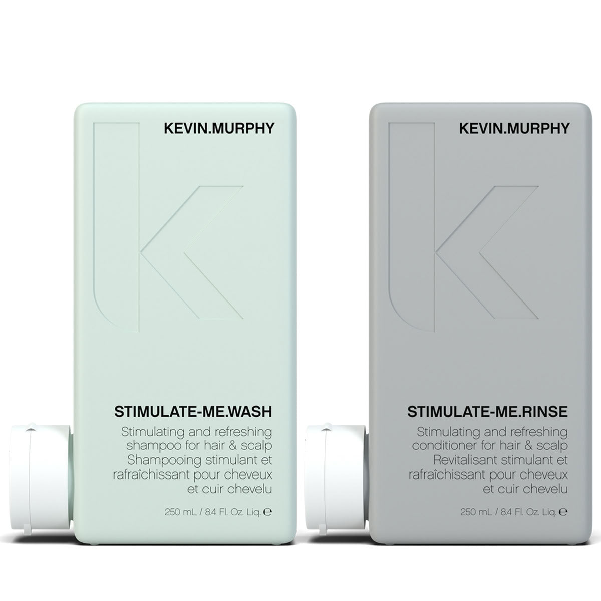 Two Kevin Murphy haircare bottles on a white background: a pale mint green Stimulate-Me Wash bottle on the left and a light gray Stimulate-Me Rinse bottle on the right, each with a white cap partially visible.