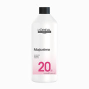 L'Oreal Majicreme hair product bottle on a white background