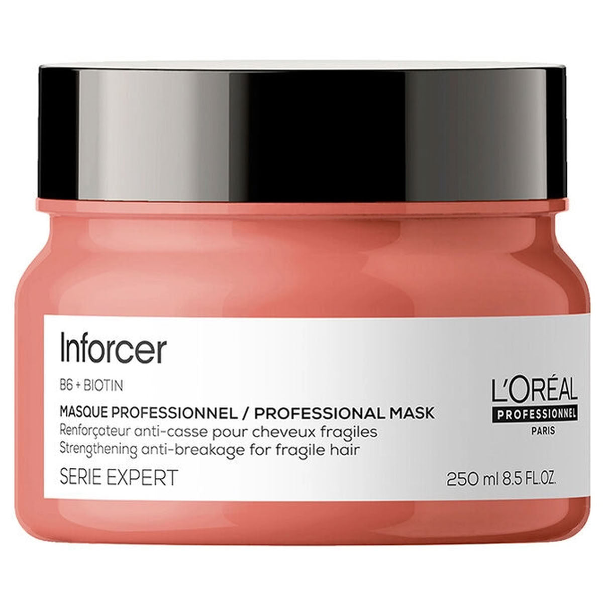 L'Oréal Professionnel Inforcer BB + Biotin Professional Mask in a coral pink jar with a black lid and white label.