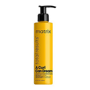 A bottle of Matrix Total Results Curl Can Dream hair treatment, featuring a bright yellow bottle with a black pump dispenser, set against a plain white background.