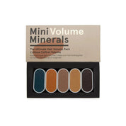 Mini Volume Minerals hair product set with four colors on a beige background