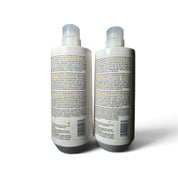 Two white plastic bottles with clear caps, showing the back labels, photographed on a white background with a soft shadow.