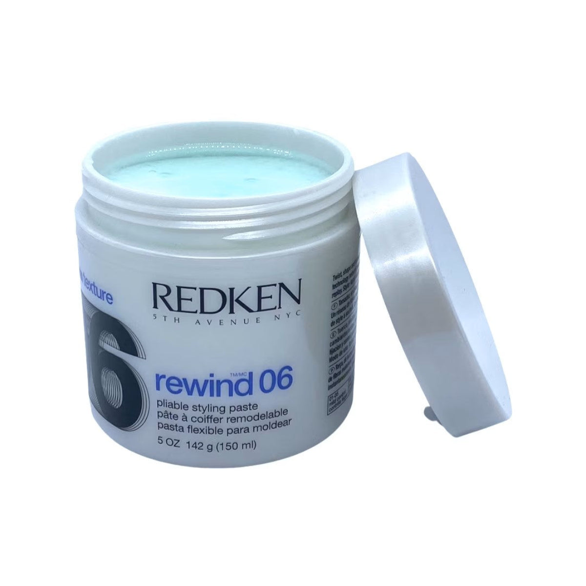 Redken rewind 06 styling paste jar on a white background