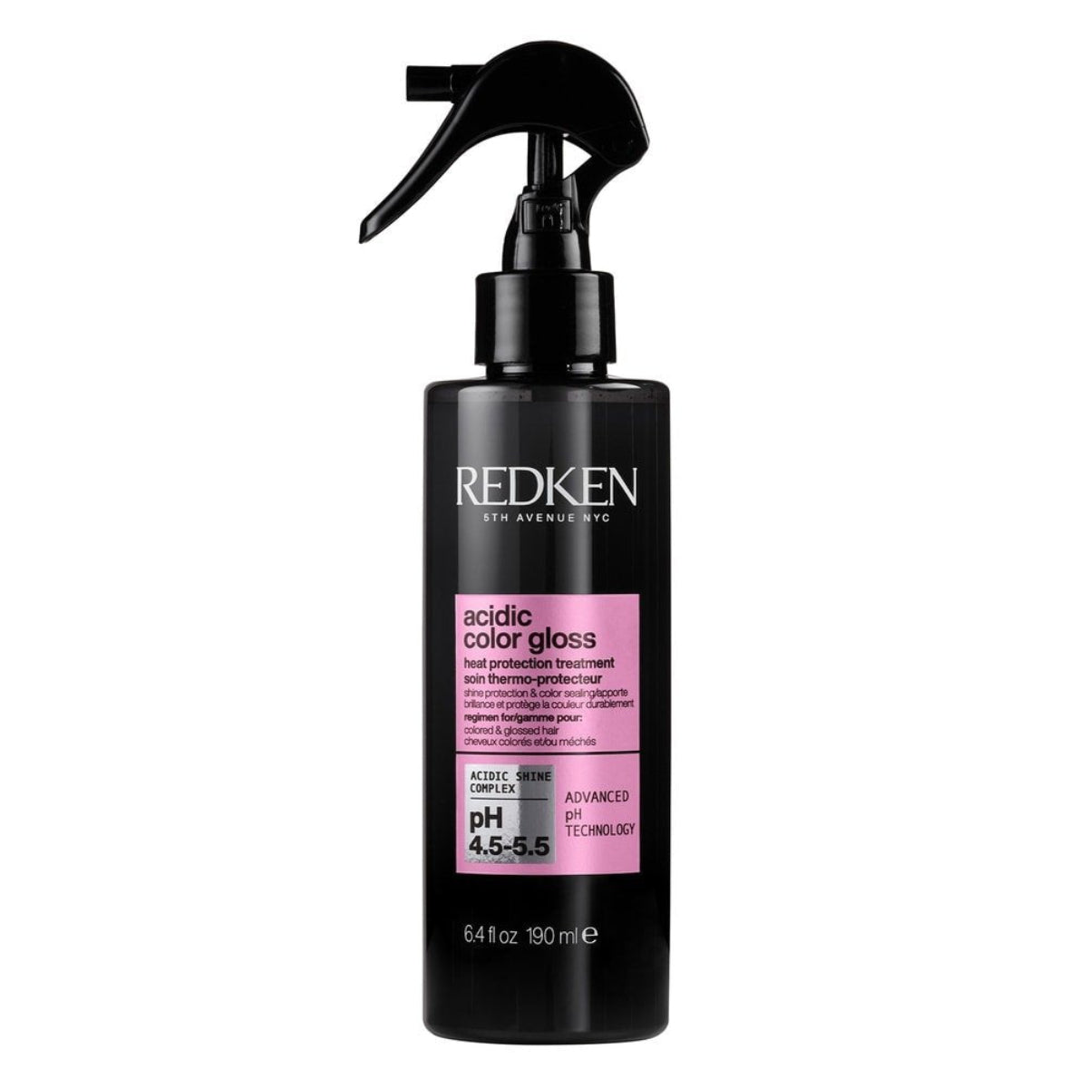 Redken hair care product bottle with black spray nozzle on a white background