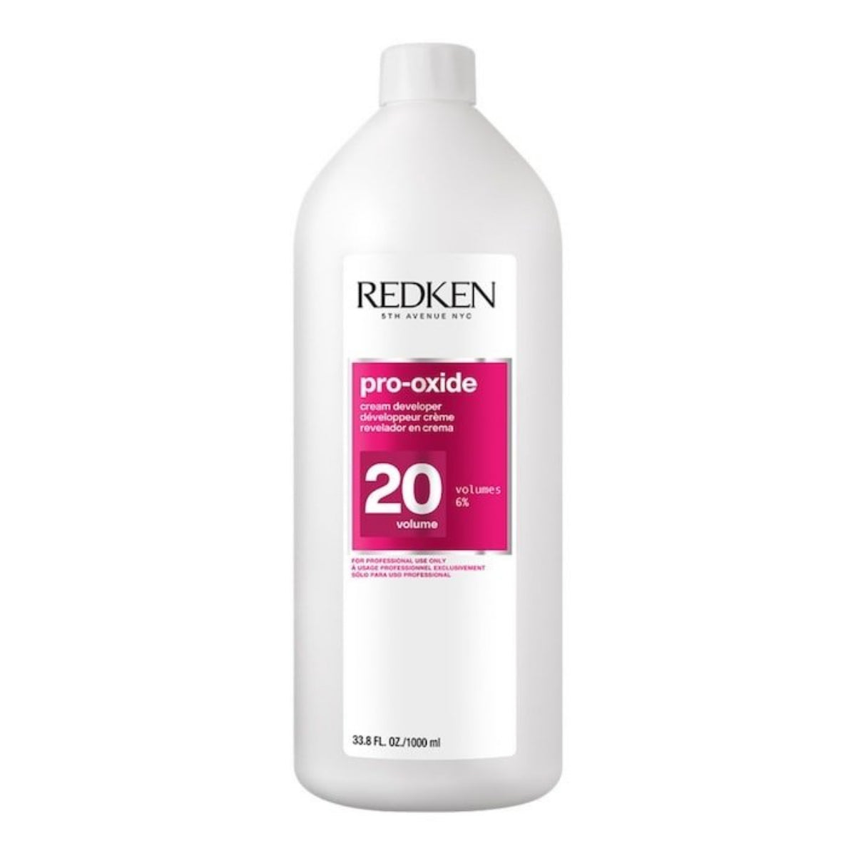 Redken hair product bottle on a white background