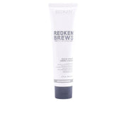 A 5 fl oz white squeeze tube of Redken Redken Brews Shave Cream Creme & Balm with a dark gray cap, centered on a plain white background.