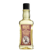 Bottle of Reuzel Daily Shampoo on a white background