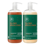 Two 1 L bottles of tea tree color protecting shampoo and conditioner side by side on a white background. The left bottle contains an amber-brown liquid and is labeled 'TEA TREE SPECIAL COLOR' as shampoo, and the right bottle contains a light beige liquid and is labeled 'TEA TREE SPECIAL COLOR' as conditioner.