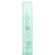 Mint green bottle of Wella Ninvigo Volume Boost hair mist on a white background