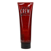 Red tube of American Crew styling gel on a white background