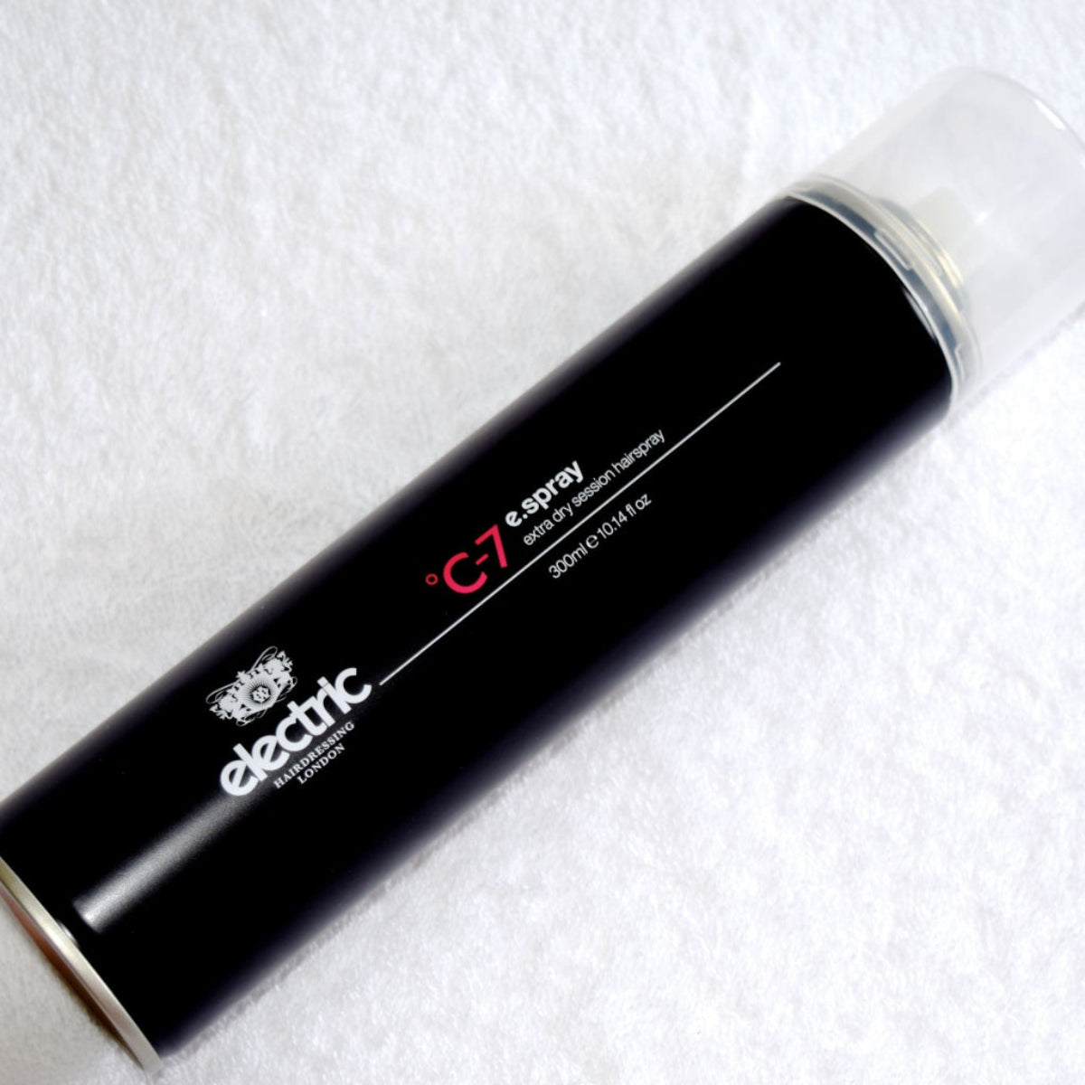 Black spray can with 'electric' branding on a white background