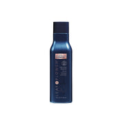 Blue shampoo bottle with 'Leaf & Flower' branding on a white background