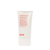 White tube of 'evo mane attention' hair treatment on a white background