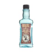 Blue bottle of Reuzel hair tonic on a white background