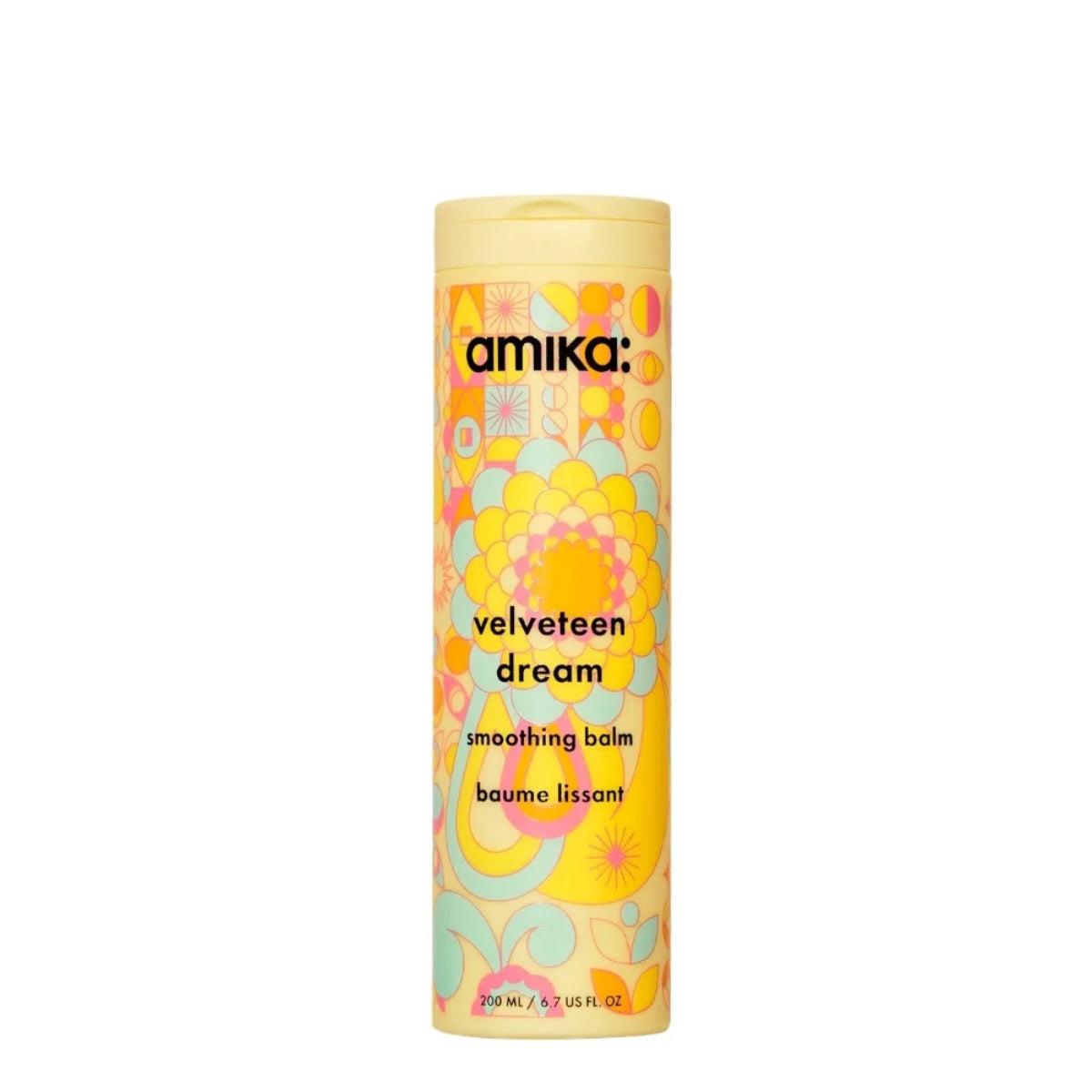 Amika Velveteen Dream Smoothing Balm in a 2 oz cylindrical bottle with a retro 1970s floral pattern in yellow, orange, and light blue on a white background.