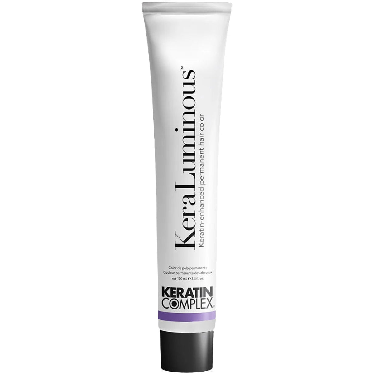 A white tube of KeraLuminous Keratin Complex permanent hair color with a black cap and a purple accent band, shown against a plain white background.