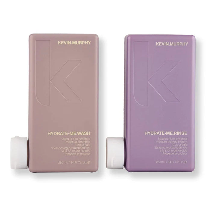 Two Kevin Murphy hair care products, Hydrate-Me Wash and Hydrate-Me Rinse, on a white background.