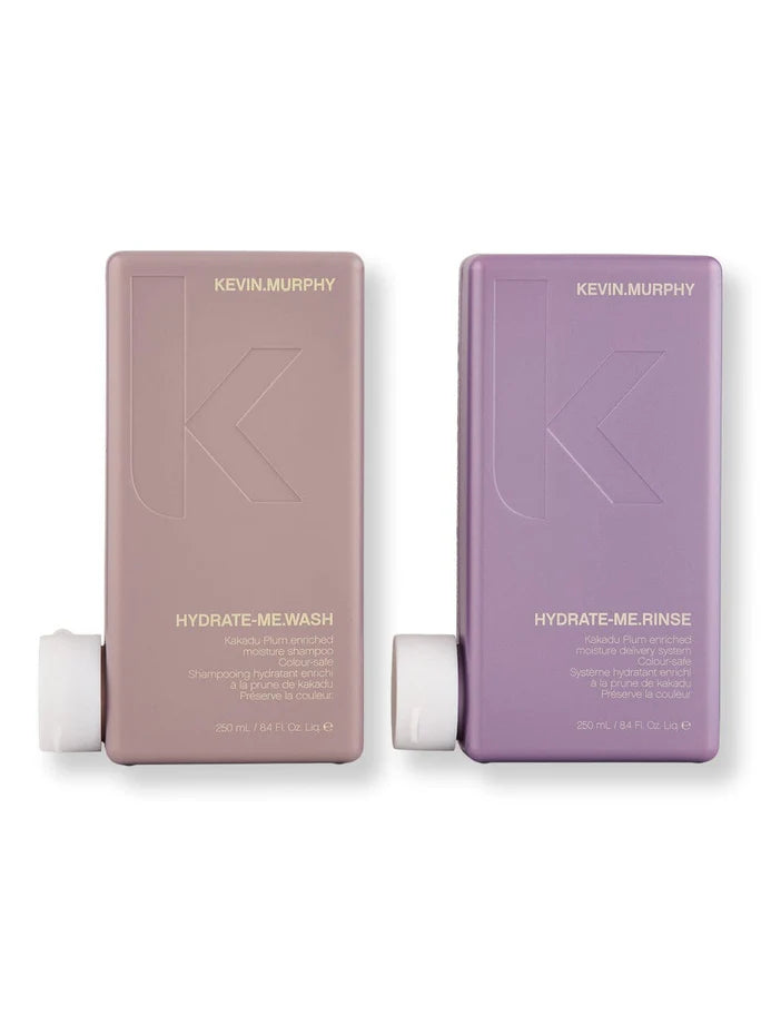 Two Kevin Murphy hair care products, Hydrate-Me Wash and Hydrate-Me Rinse, on a white background.