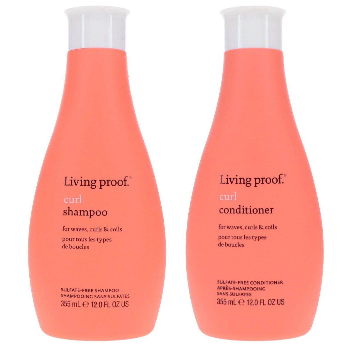 Living Proof curl shampoo and conditioner bottles on a white background