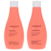 Living Proof curl shampoo and conditioner bottles on a white background