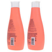 Two coral-colored bottles with white caps on a white background