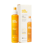 Milk Shake Incredible Milk 12 Effects hair growth spray bottle and its packaging box, shown on a clean white background with a circular badge that reads 'in salons now'.