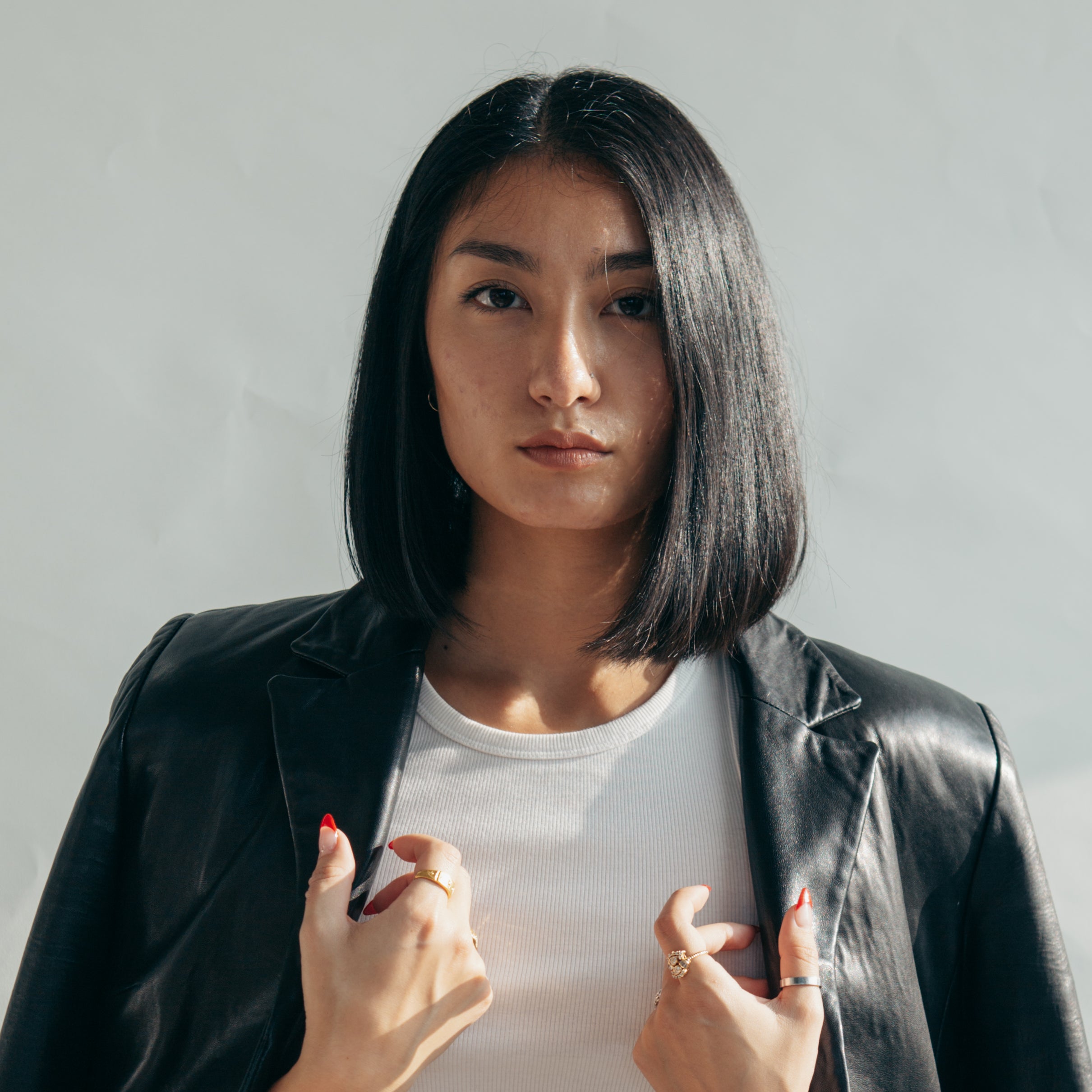 model-with-leather-jacket-over-shoulders.jpg