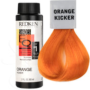 Redken Shades EQ hair color bottle with an orange sample on a white background