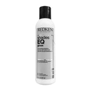 Redken Shades EQ gloss bottle on a white background