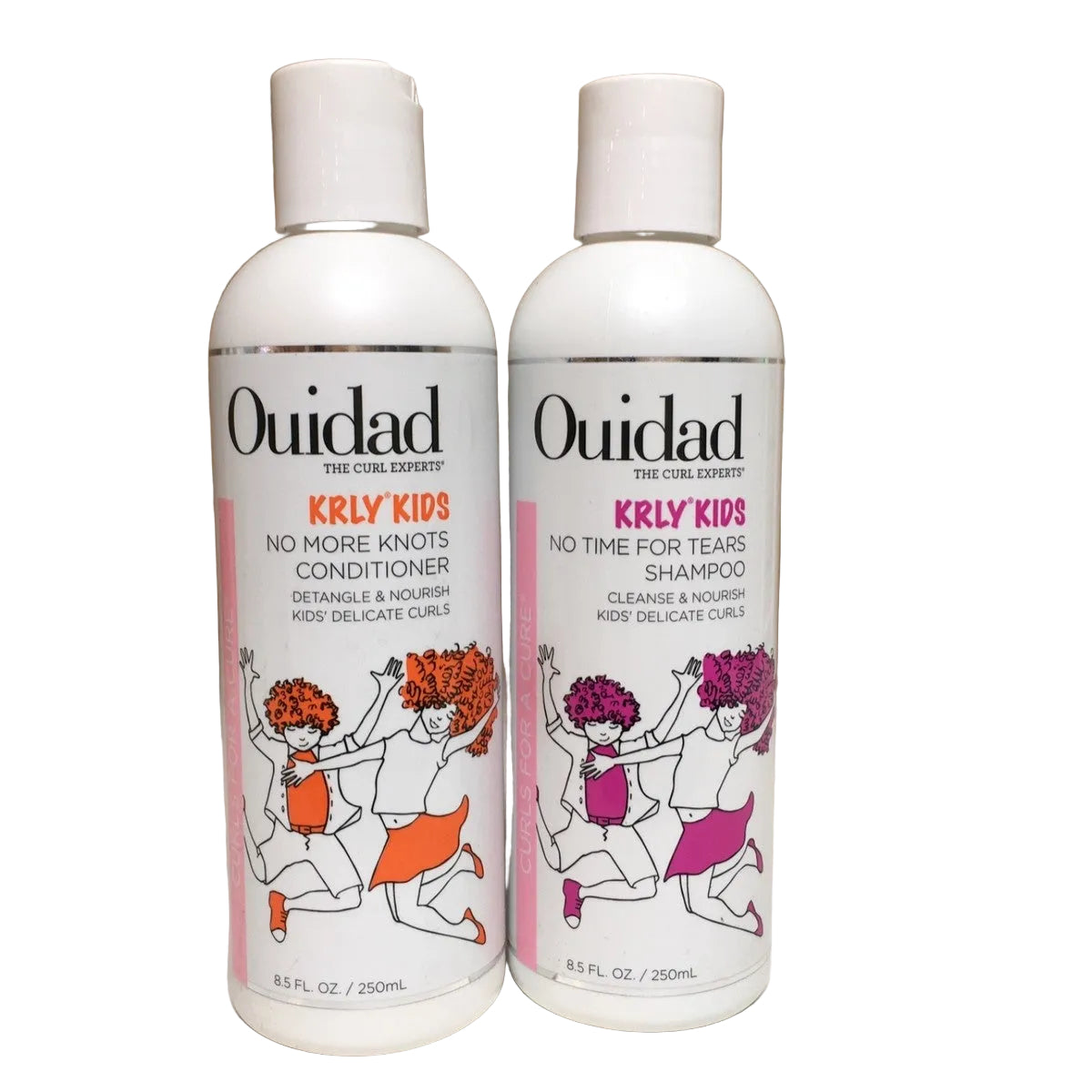 Two white bottles of Ouidad The Curl Expert Krly Kids haircare products, one conditioner and one shampoo, standing side by side against a plain beige background.
